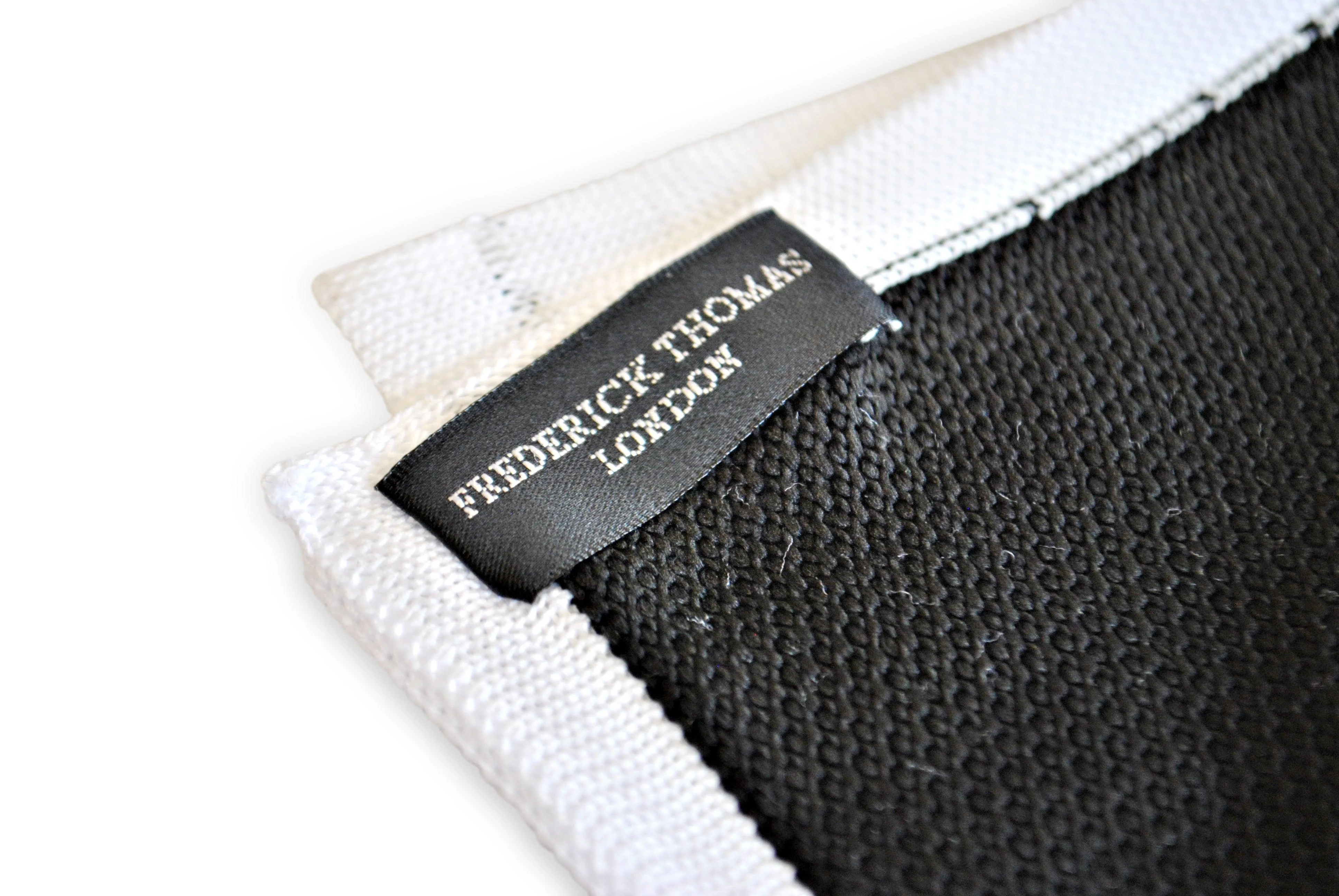 black knitted pocket square with white edging - Image 2