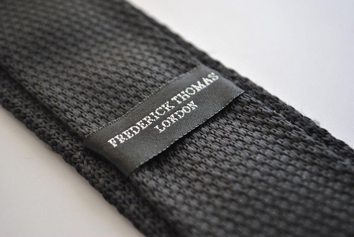 black skinny knitted tie with light blush pink polka dots - Image 3