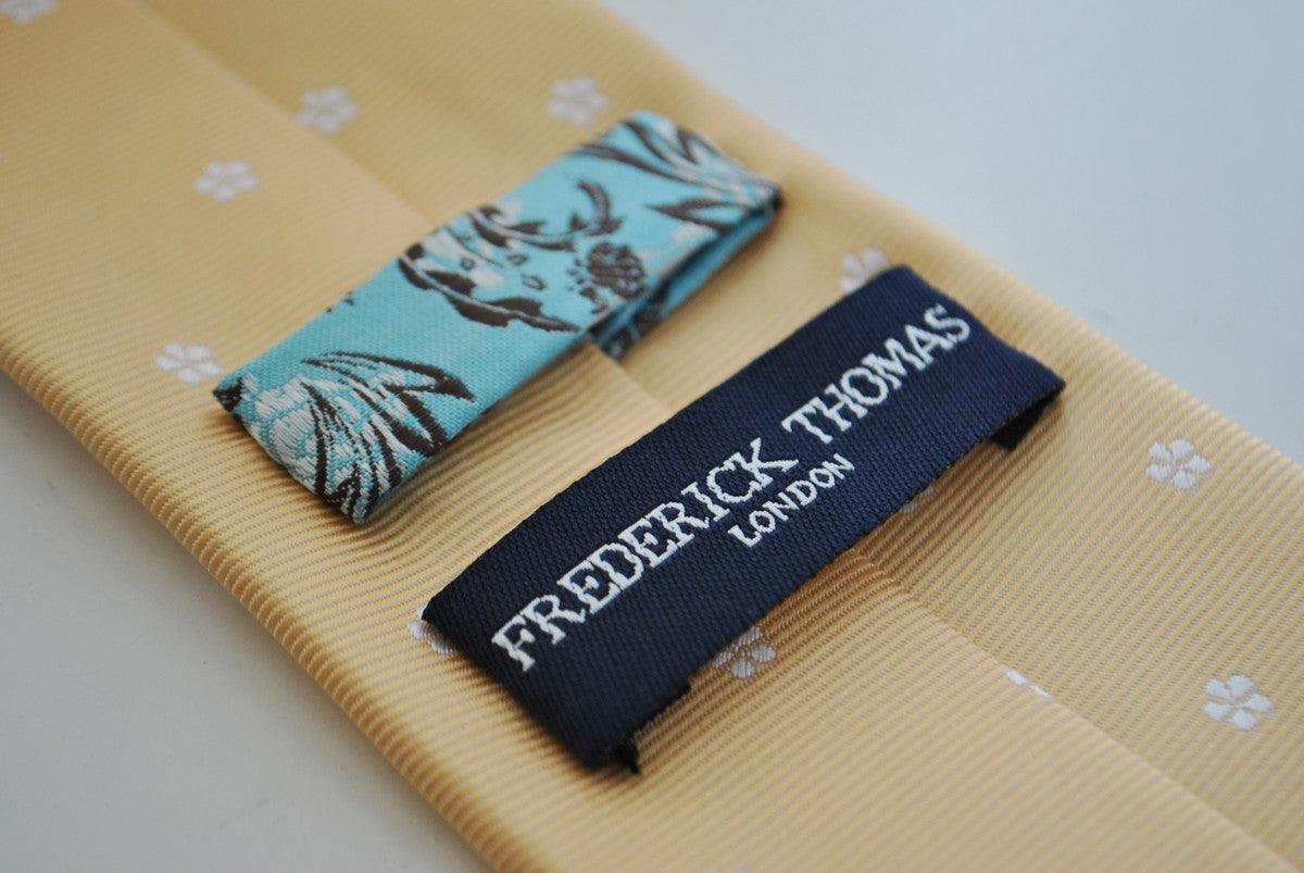 pale yellow tie with flower pattern - Image 2