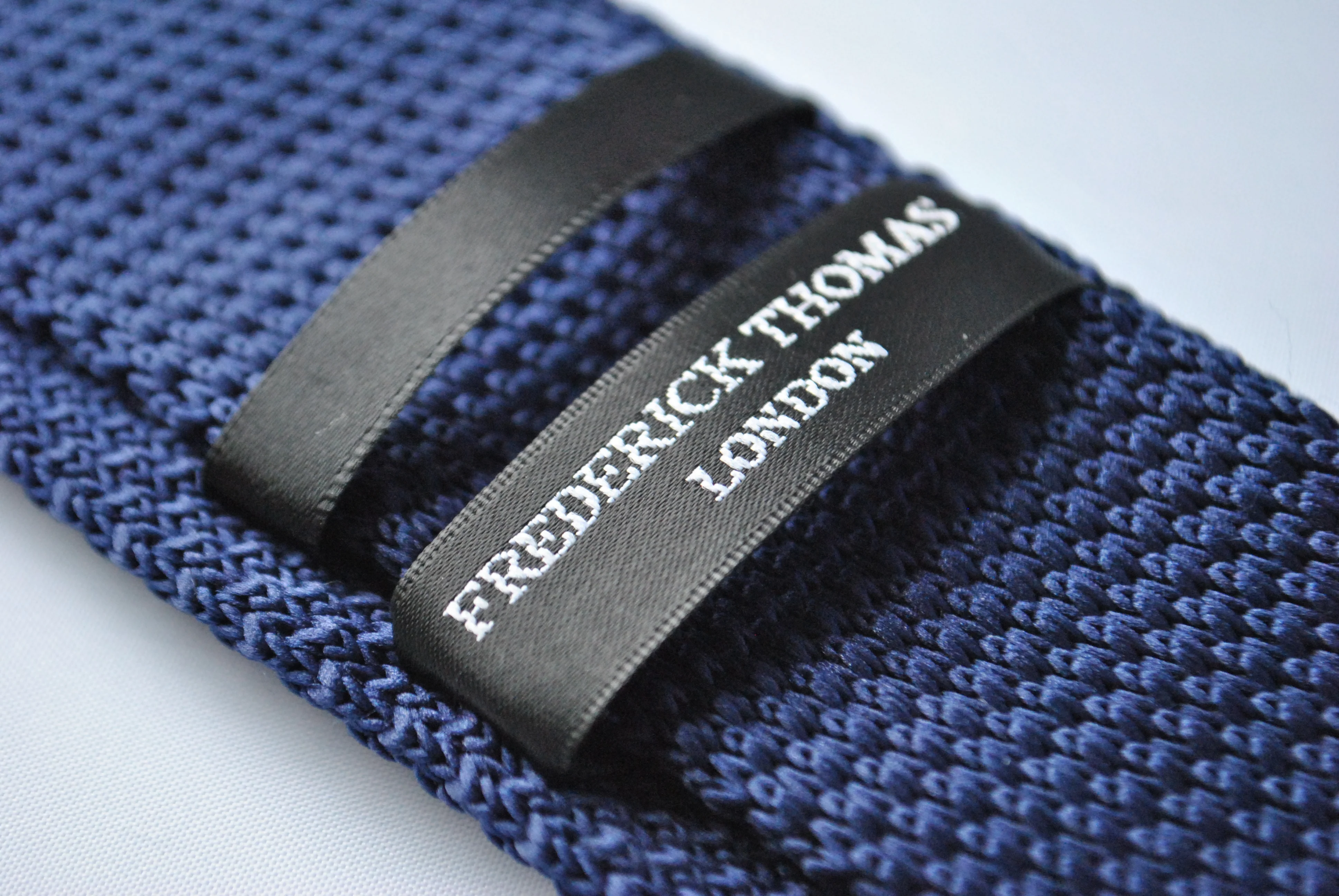 navy blue skinny knitted tie with green polka dots - Image 3