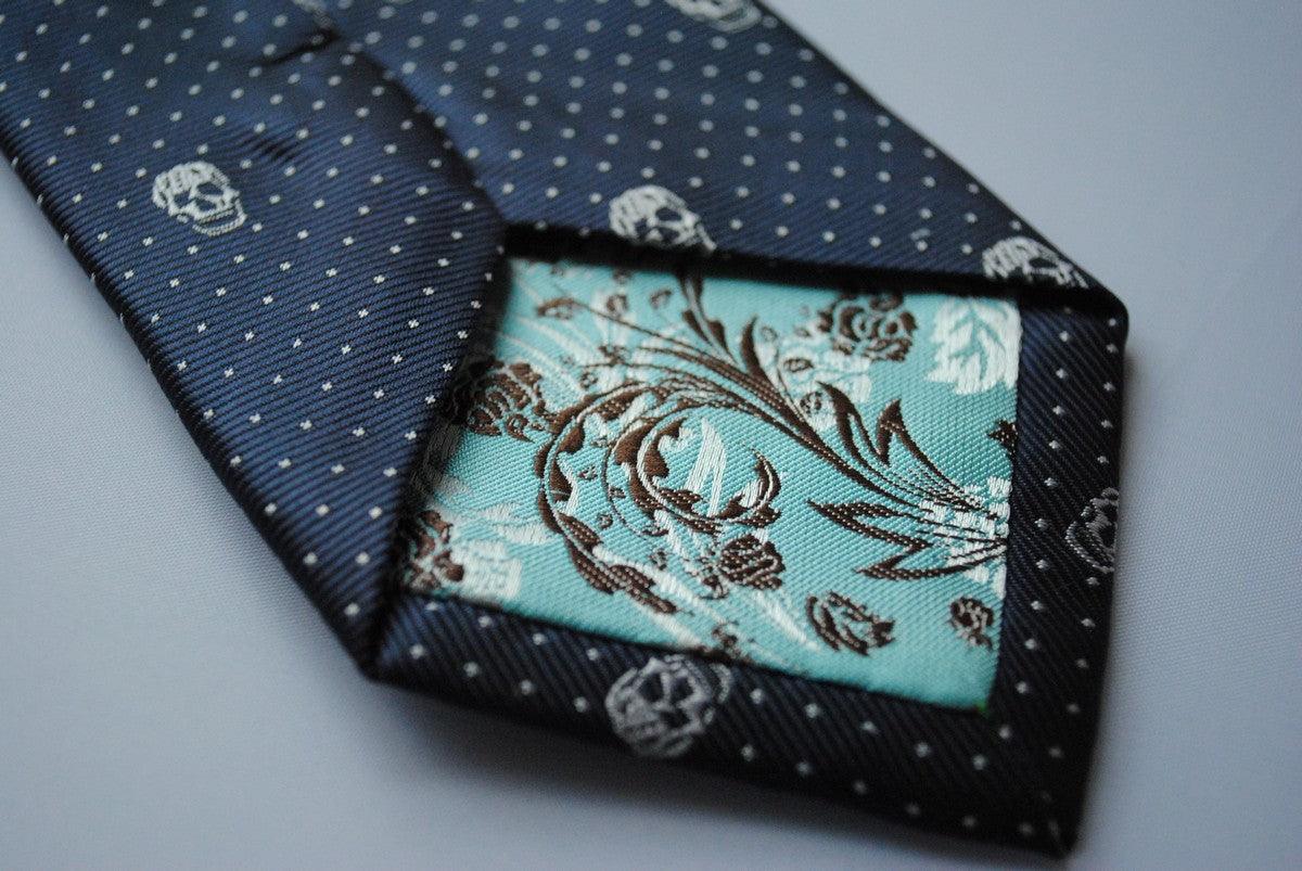 navy blue tie with embroidered white skulls design - Image 4