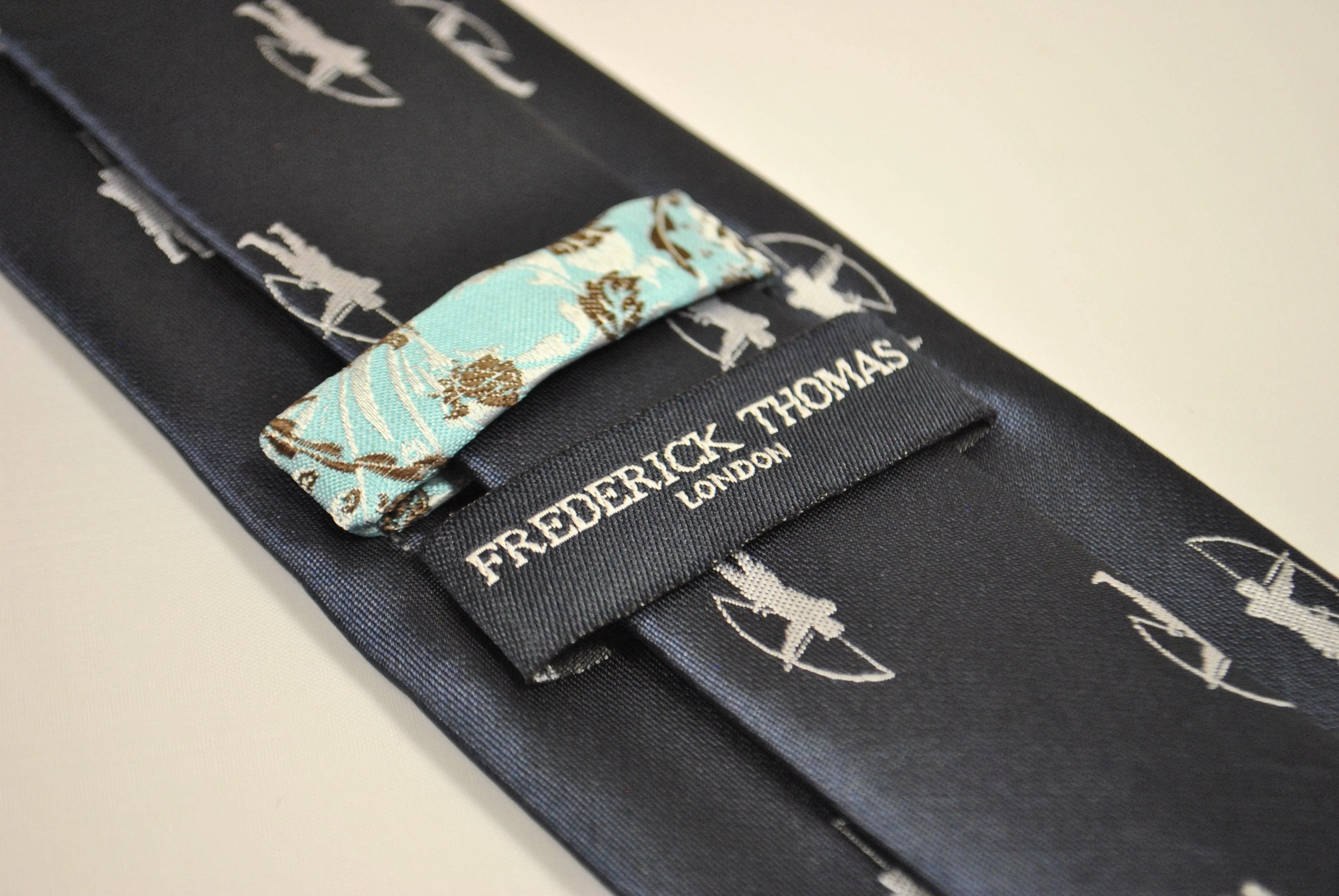 navy blue tie with archer silhouette design - Image 2