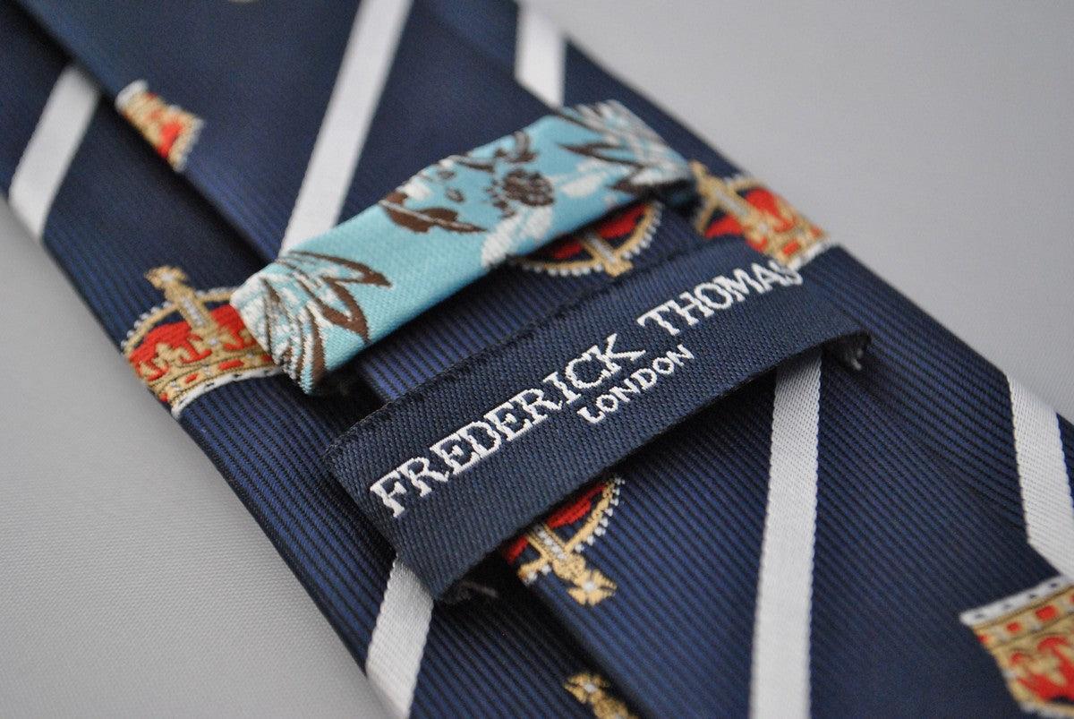 navy blue tie with crown design and white stripes - Image 3