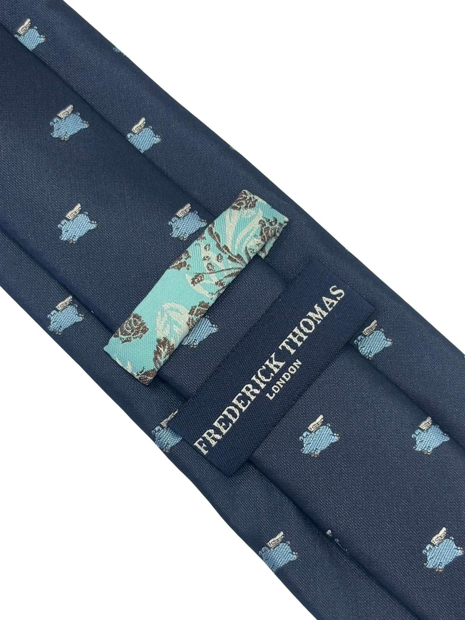 navy blue tie with light blue flying pig design - Image 4