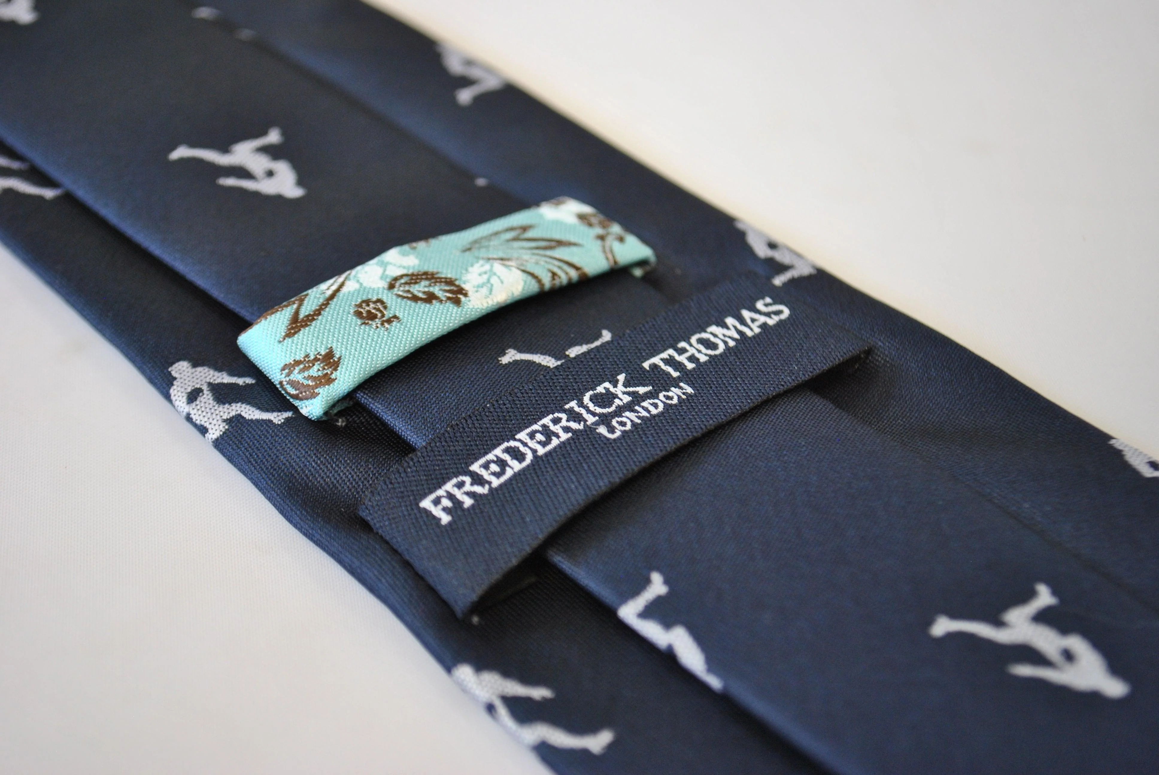 navy tie with rugby player silhouette design - Image 2