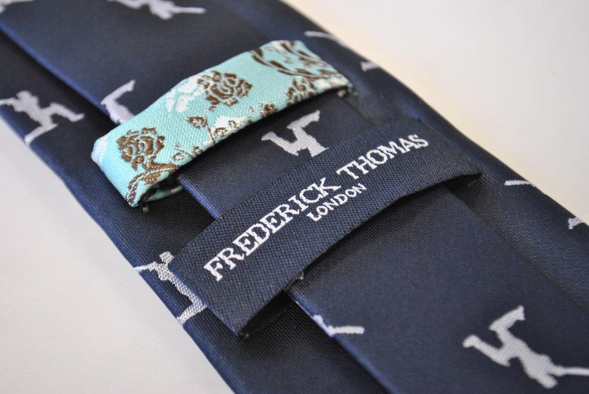 navy tie with white cricket player silhouette design - Image 4