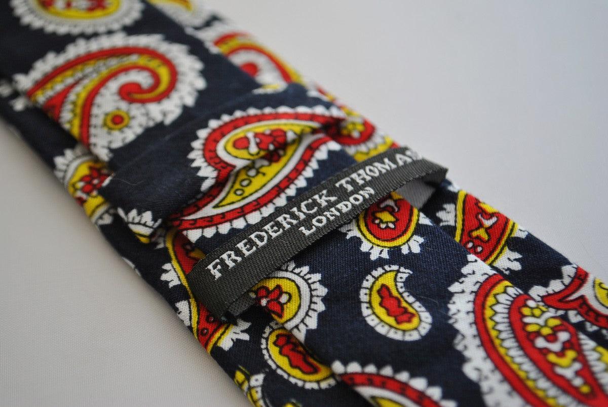 skinny cotton black tie with red and yellow paisley design - Image 2
